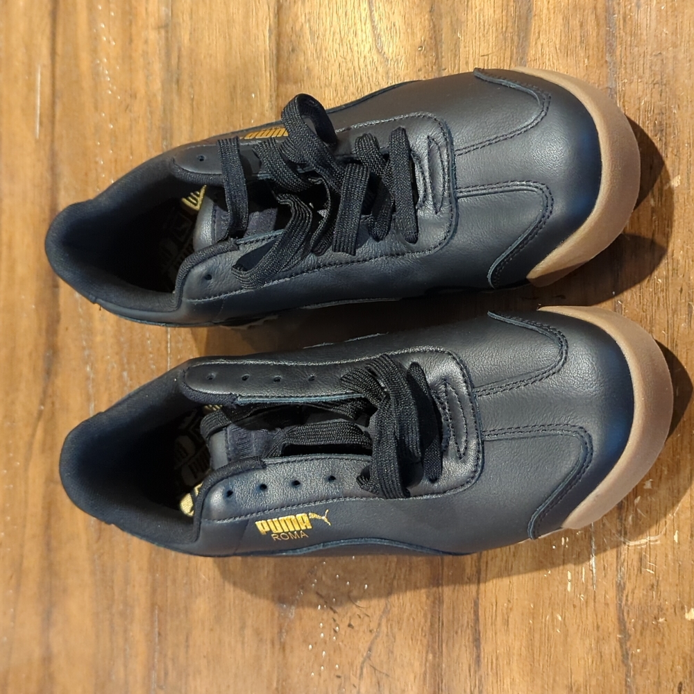 Puma Roma Black and Gold size 11